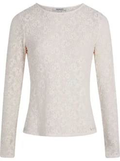 Top écru avec broderie florale avec une coupe moulante et un col rond