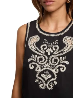 Top en coton black uni pourvu d'une coupe droite et d'un col rond