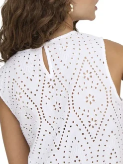 Top en coton blanc uni avec une coupe droite et un col rond