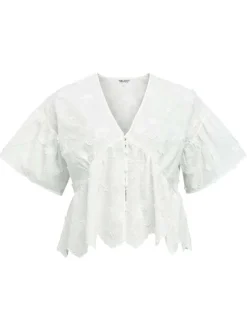Top en coton blanc uni pourvu d'un col v et d'une coupe droite