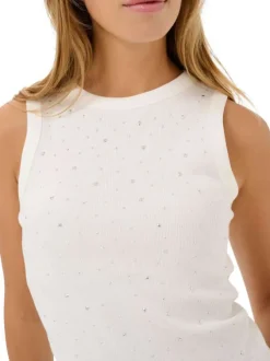 Top en coton blanc uni pourvu d'une coupe ajustée et d'un col rond