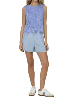 Top en coton bleu uni avec une coupe droite et un col rond
