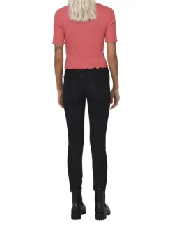 Top en coton rose uni coupe droite avec un col v et boutonné à l'avant