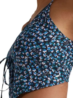 Top à fines bretelles marine fleuri avec une coupe cropped et un col v