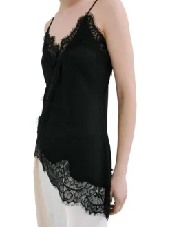 Top noir uni sans manche pourvu d'une coupe asymétrique et d'un col v