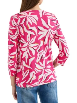 Top rose à motifs pourvu d'un col v à nouer et d'une coupe droite
