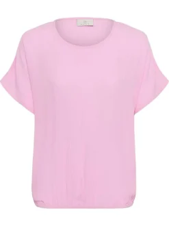 Top rose uni pourvu d'une coupe ample et de manches courtes