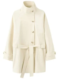 Trench coat long en coton beige uni avec une coupe ample et un col montant