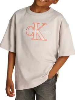 T-shirt en coton beige uni avec un col rond et le nom de la marque brodé en gros