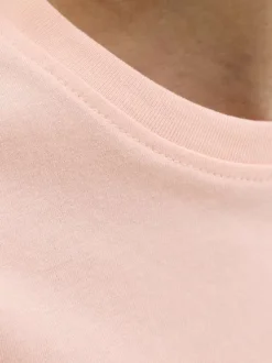 T-shirt en coton biologique corail imprimé avec une coupe droite et un col rond