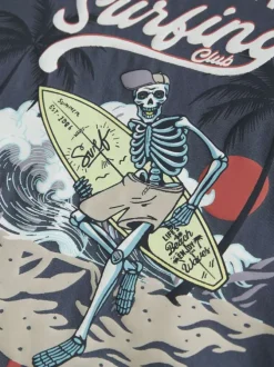 T-shirt en coton biologique indigo uni pourvu d'un imprimé squelette