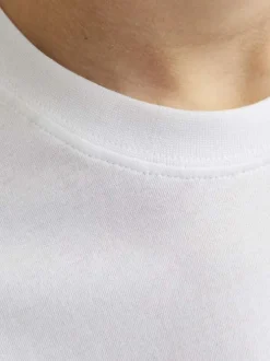 T-shirt en coton blanc imprimé rouge avec une coupe ample et un col rond