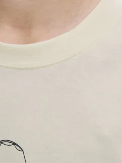 T-shirt en coton écru avec un imprimé squelette et un col rond