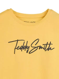 T-shirt en coton jaune uni à col rond avec le nom de la marque imprimé