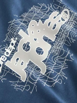 T-shirt en coton pétrole uni avec une coupe droite et un col rond