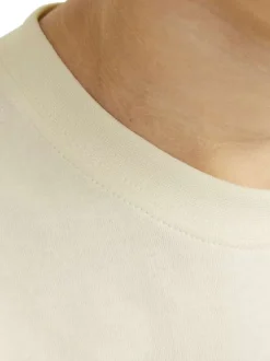 T-shirt manches courtes en coton écru imprimé avec coupe ample et col rond