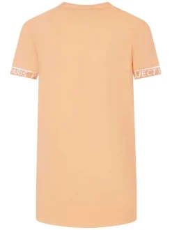 T-shirt pêche uni avec une coupe droite à col rond et des manches courtes