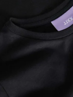 T-shirt Anna en coton biologique mélangé noir avec col rond et logo blanc floqué