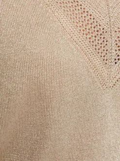 T-shirt beige en lurex avec une coupe droite un col v et des manches courtes