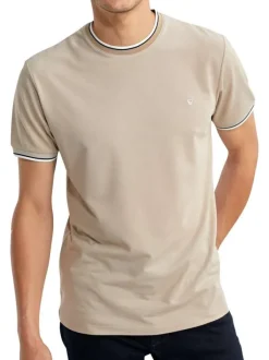 T-shirt beige uni pourvu de manches courtes et d'un col rond