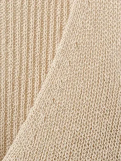 T-shirt beige uni sans manche pourvu d'une coupe droite et d'un col v