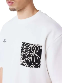 T-shirt blanc uni avec une coupe ajustée un col rond et des manches courtes