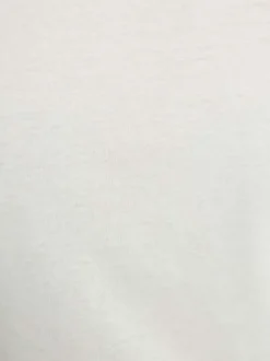 T-shirt blanc uni avec une coupe droite et des manches courtes