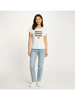 T-shirt blanc uni pourvu de manches courtes et d'un col rond