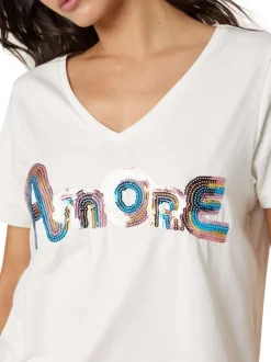 T-shirt blanc uni pourvu de manches courtes et d'une coupe droite