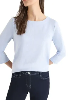 T-shirt bleu clair à rayures pourvu d'une coupe droite et d'un col rond