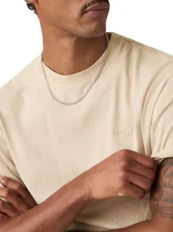 T-shirt en coton beige à coupe droite pourvu d'un col rond finement côtelé