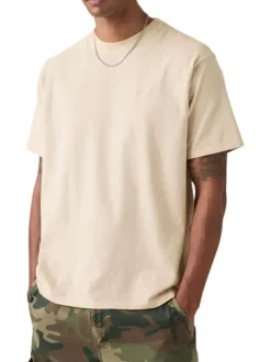 T-shirt en coton beige à coupe droite pourvu d'un col rond finement côtelé