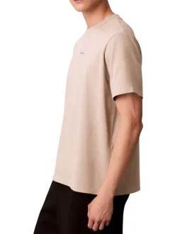 T-shirt en coton beige à coupe droite pourvu d'un col rond ras de cou
