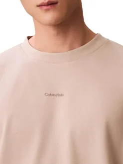 T-shirt en coton beige à coupe droite pourvu d'un col rond ras de cou