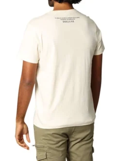 T-shirt en coton beige imprimé avec un col rond et une coupe droite