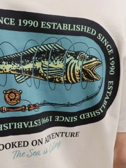 T-shirt en coton beige imprimé avec une coupe droite et un col rond