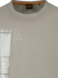 T-shirt en coton beige imprimé avec une coupe droite et un col rond