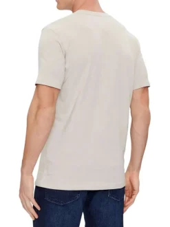 T-shirt en coton beige uni avec une coupe droite et un col rond