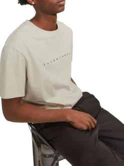T-shirt en coton beige uni avec une coupe droite et un col rond
