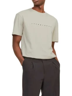 T-shirt en coton beige uni avec une coupe droite et un col rond