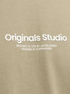 T-shirt en coton beige uni à coupe droite avec une petite écriture à la poitrine