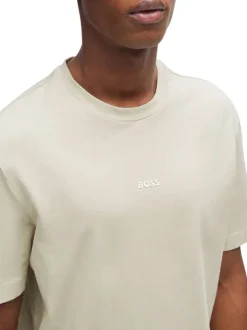 T-shirt en coton beige uni à coupe droite et à col rond avec le nom de la marque