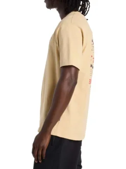 T-shirt en coton beige uni pourvu d'un col rond et de manches courtes