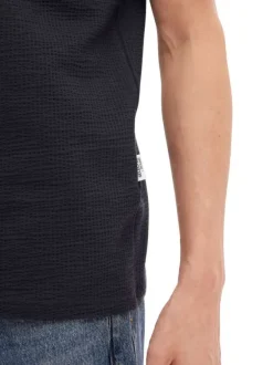T-shirt en coton biologique marine uni avec une coupe droite
