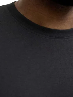T-shirt en coton biologique noir à coupe droite pourvu de manches courtes