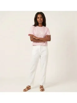 T-shirt en coton biologique rose uni pourvu de broderies coquillages