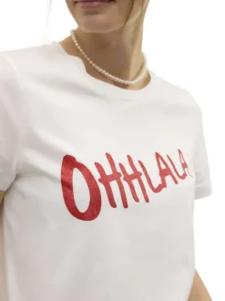 T-shirt en coton blanc avec une écriture pailletée et un col rond