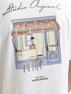 T-shirt en coton blanc à coupe large avec boutique imprimée au dos et col rond
