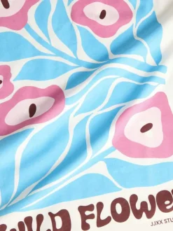 T-shirt en coton blanc à motifs imprimés pourvu d'une coupe droite