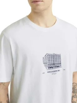 T-shirt en coton blanc uni avec un col rond et une coupe droite